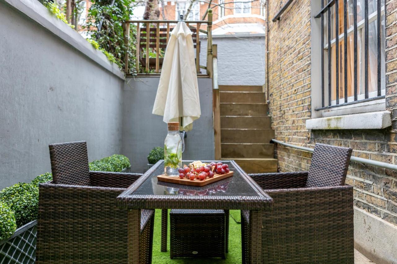 Elegant Kensington Apartment With Patio Londra Exterior foto