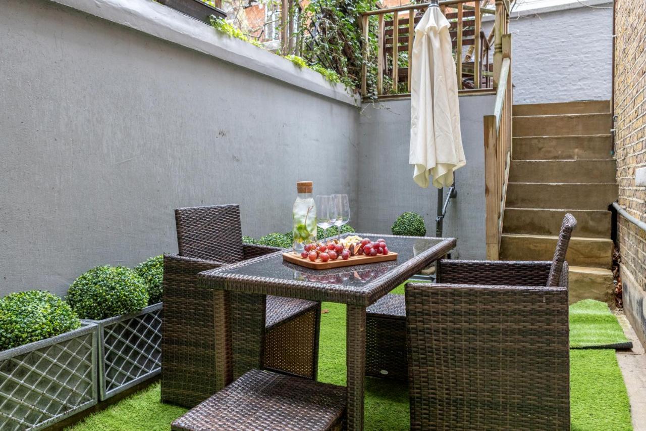 Elegant Kensington Apartment With Patio Londra Exterior foto